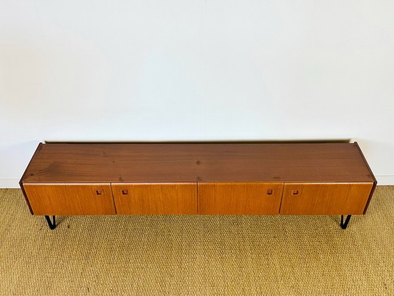 Image 1 of Low Scandinavian teak sideboard with metal compass legs, 1960
