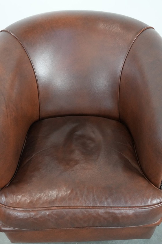 Image 1 of Cognac-colored cowhide leather club armchair in English style with a luxurious appearance