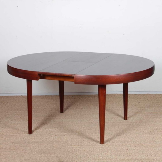 Image 1 of Table de repas ronde extensible en palissandre de Rio, 1960