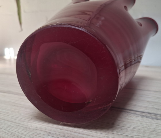 Image 1 of Solid red handkerchief vase.