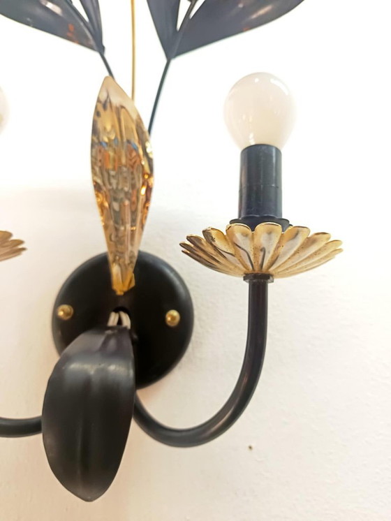 Image 1 of Wandlamp in zwart-gouden Hollywood Regency-bladvorm