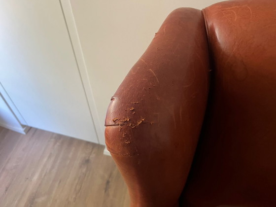 Image 1 of Poltrona con orecchie in pelle