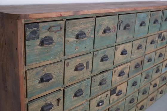 Image 1 of Gran armario industrial francés de madera de pino pintada para guardar artículos de ferretería, década de 1950