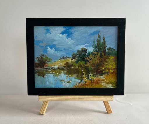 Origineel olieverfschilderij: Zomers rivierlandschap, een verloren hoekje van de natuur.