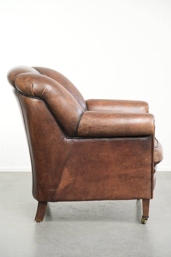 Characterful and comfortable vintage sheepskin armchair with a unique design and a timeless look – Leather (photo 3 of 15)