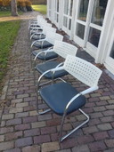 8 Vitra vis a vis sled chairs
