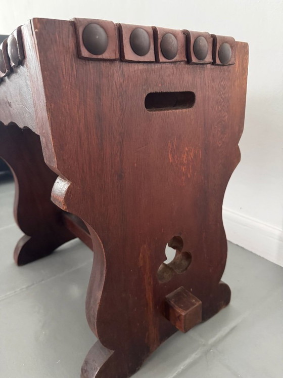Image 1 of Tabouret espagnol à assise en cuir tressé, piètement à tréteaux et motifs ajourés