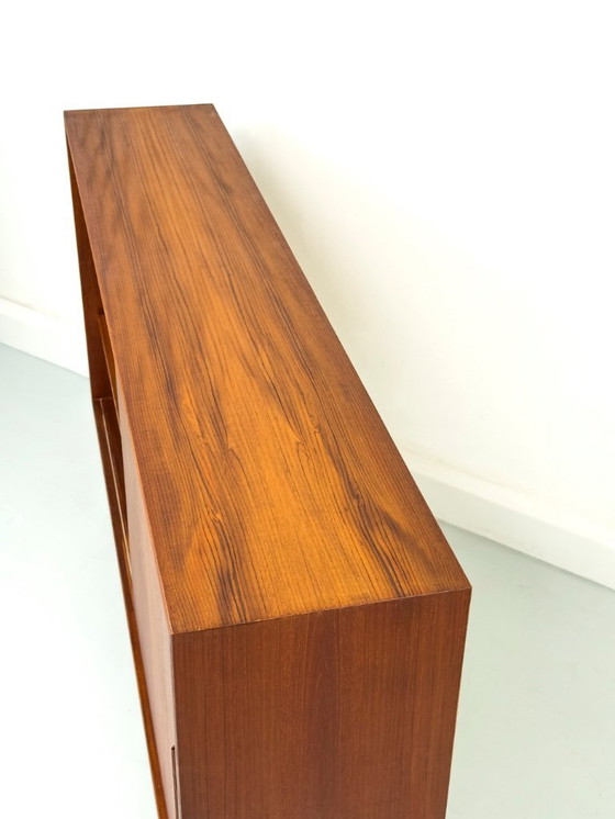 Image 1 of Tablero alto de teca con puerta corredera, años 60