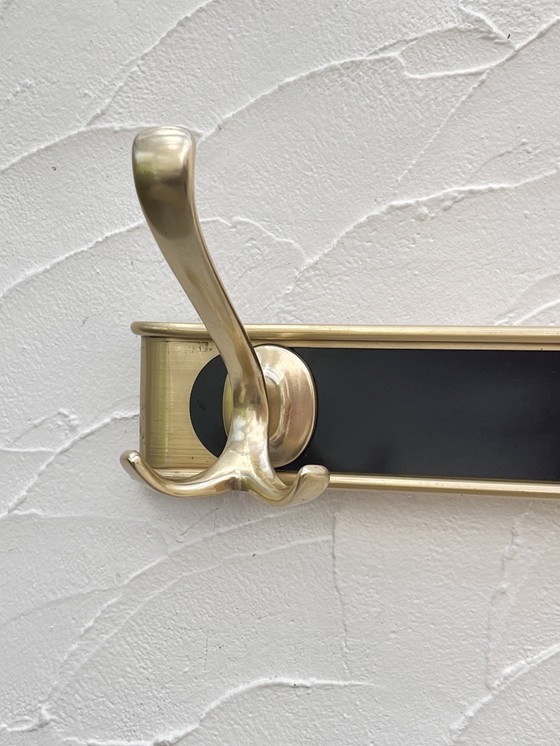 Image 1 of Kleiderständer aus goldfarbenem Aluminium