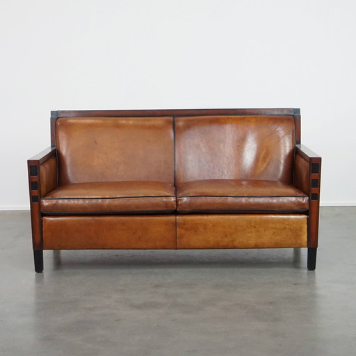 Schapenleren 2-Zits Art Deco Design Bank Met Hout En Zwarte Biezen