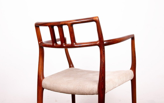 Image 1 of Fauteuil Danois en Palissandre et tissu, modèle 64 par Niels Otto Moller pour Moller’s Mobelfabrik 1960.