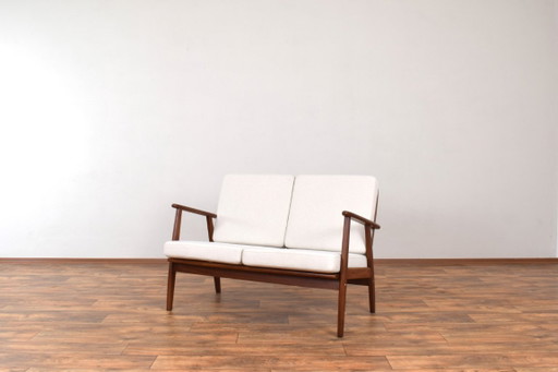 Zweisitzer-Sofa aus dänischem Teakholz aus der Mitte des 20. Jahrhunderts, 1960er Jahre.