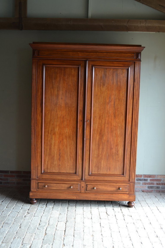 Image 1 of Sleek antique mahogany cabinet.