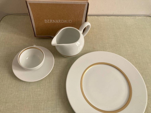 Set Bernardaud Teller Astre 21cm + Teetasse und Untertasse Boule 13 cl + Milchkrug Cronos Gold