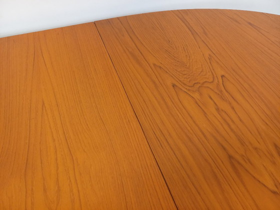 Image 1 of Vintage Baumann oval teak dining table from the 1960s/70s with extensions