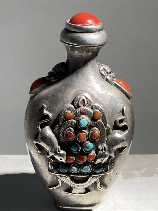 Antique kohl bottle, partially made of silver, inlaid with turquoise and coral