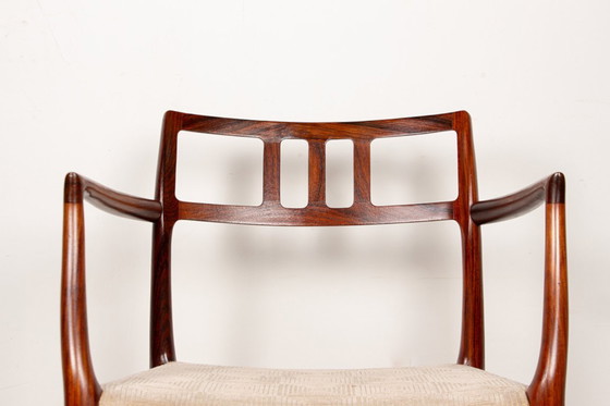 Image 1 of Fauteuil Danois en Palissandre et tissu, modèle 64 par Niels Otto Moller pour Moller’s Mobelfabrik 1960.