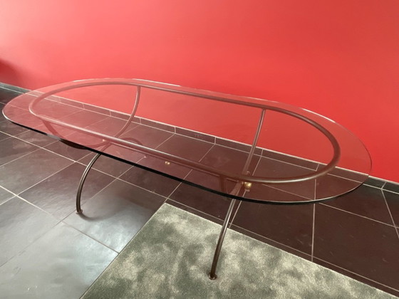 Image 1 of Wrought iron dining room table with 6 chairs made in Provence by local art smith (2005).