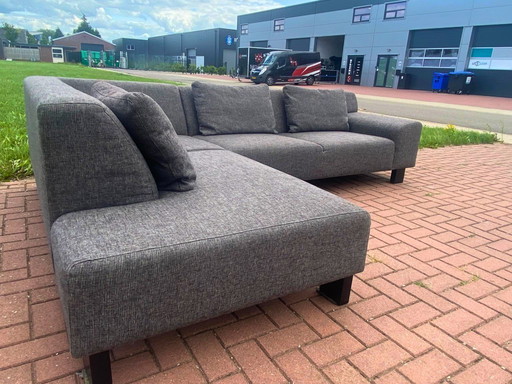 Canapé d'angle moderne en tissu gris