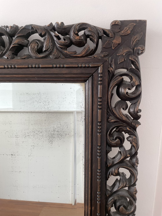 Image 1 of Antique Mirror With Facet And Floral Pattern Woodcarving