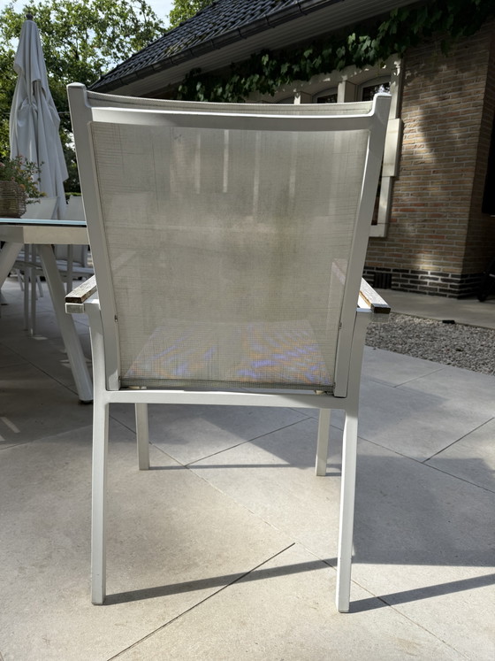 Image 1 of 10 white textile garden chairs