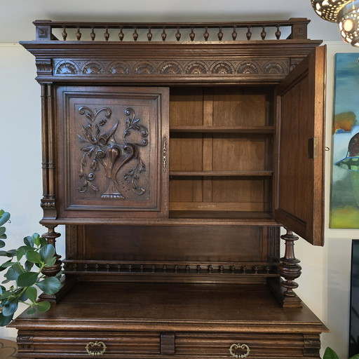 Antique wooden cabinet with lots of storage space