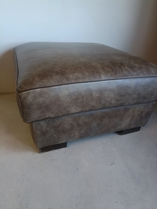 Brown leather hocker