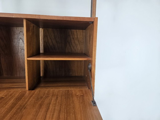 Image 1 of 1960s teak floor/sky bookcase with shelves and compartment