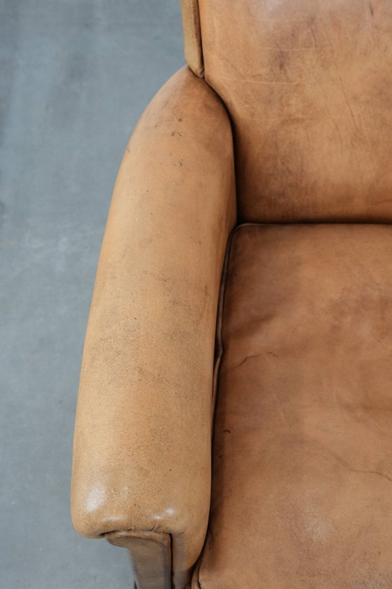 Image 1 of 2 x Subtiele vintage schapenleren fauteuil met een mooie lichte kleur