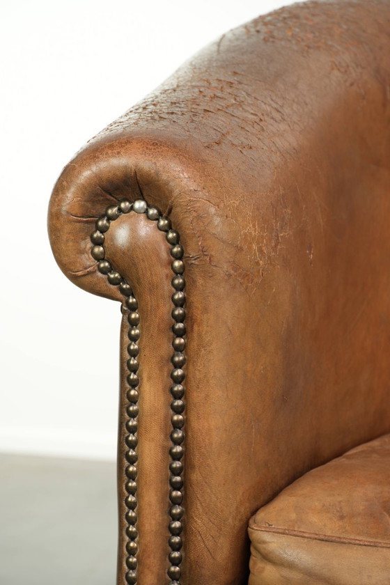 Sturdy Worn Vintage Sheepskin Club Armchair With A Comfortable Seat And A Beautiful Color – Leather (photo 11 of 13)