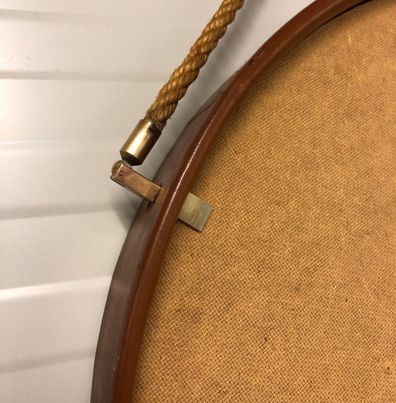 Image 1 of https://www.1stdibs.com/furniture/mirrors/wall-mirrors/pizzetti-cognac-leather-mirror-1950s-italy/id-f_33697732/