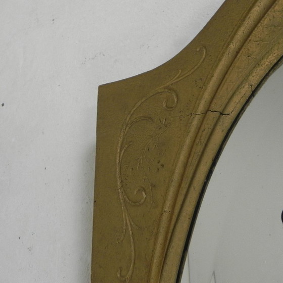 Image 1 of Gold oval mirror with cut edge, 1950s