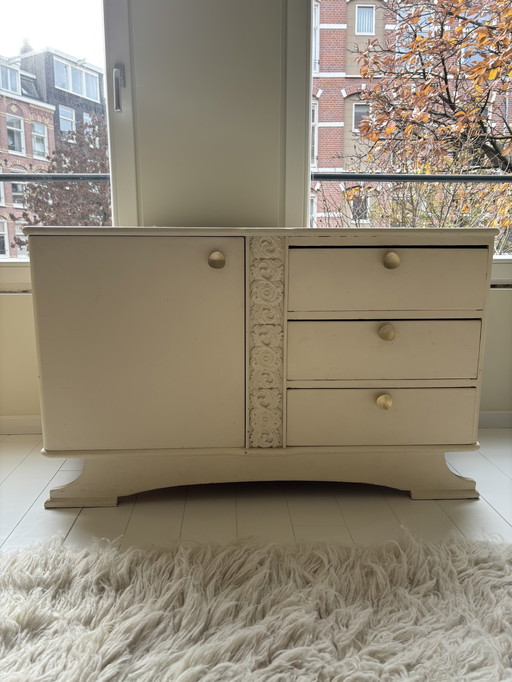 Art Deco sideboard with beautiful woodwork and gold knobs
