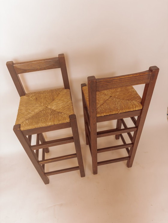 Image 1 of Ensemble de 2 tabourets de bar vintage en bois avec assise en jonc