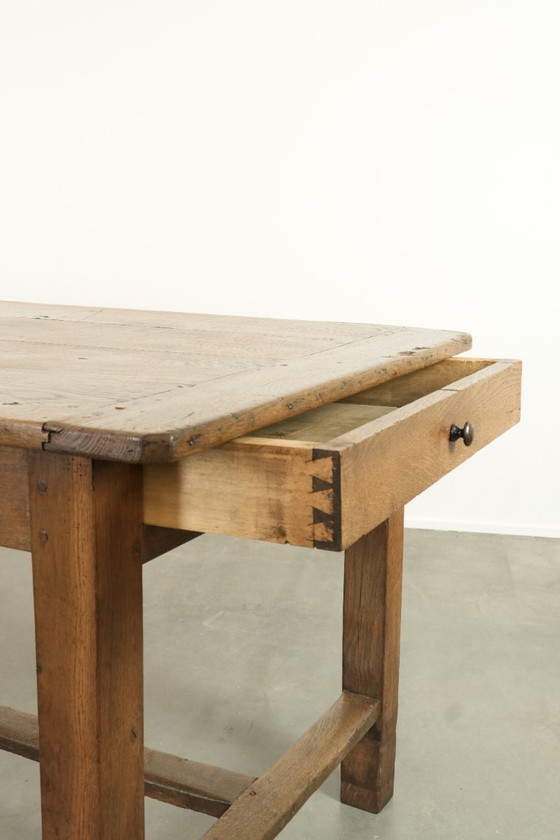 Image 1 of Large antique French farmhouse dining table made of oak from the early 1800s