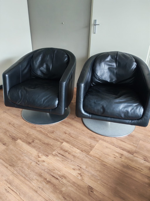 2 sillones giratorios de piel Natuzzi