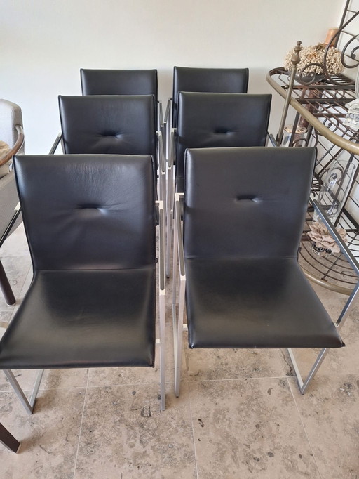 6 stylish black leather chairs from the with Arco