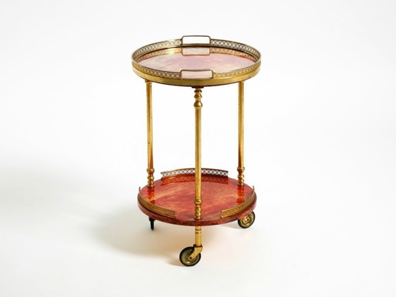 Image 1 of Round, small 1960s Aldo Tura serving or bar trolley in red goatskin leather | Made in Italy