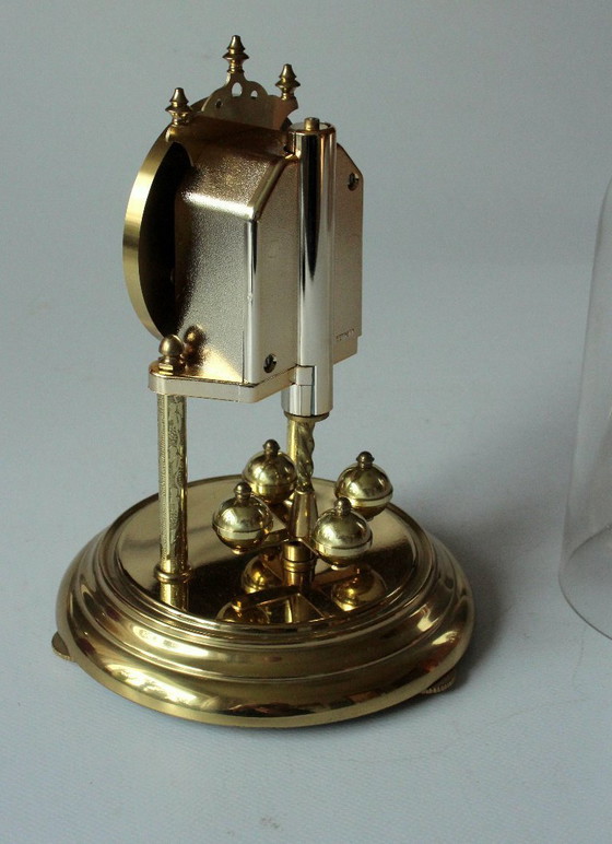 Image 1 of Elegant Hermle brass torsion pendulum clock with glass dome - Vintage