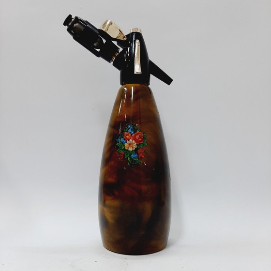 Image 1 of Vintage jaren 70 gele/bruine metalen frisdrankfles