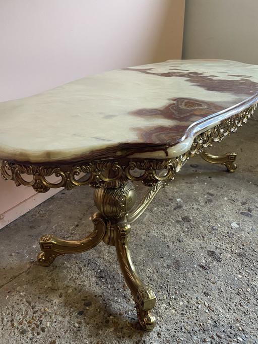 Vintage coffee table with brass base and onyx marble top