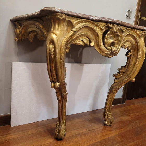 Image 1 of Consolle a muro, in legno intagliato e dorato, stile Luigi XV, XVIII secolo – Francia