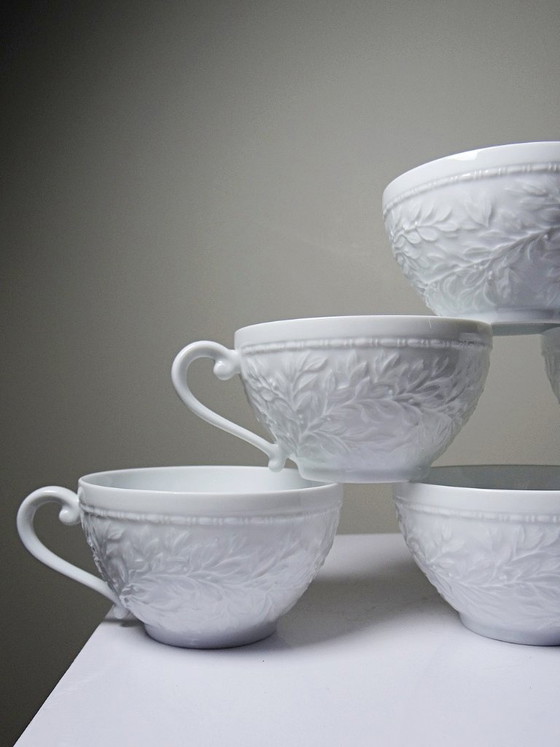 Juego de 6 tazas de porcelana blanca Bernardaud Limoges con diseño Louvre. – Loza, Porcelain (photo 8 of 12)