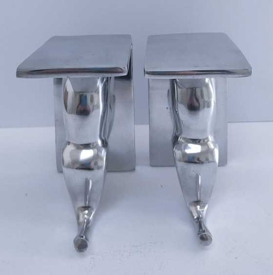 Image 1 of een paar boekensteunen in de vorm van olifanten, gegoten aluminium