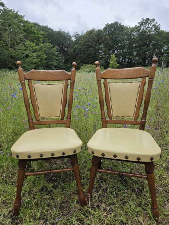 Image 1 of Set of 2 solid oak chairs with decorative nails