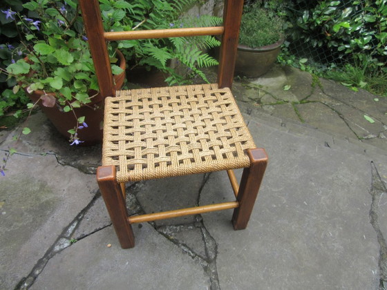 Image 1 of Vintage Child's Chair Dark Wood Woven Seat