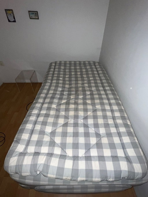 Grey and white Hästens Adjustable box spring 100x200