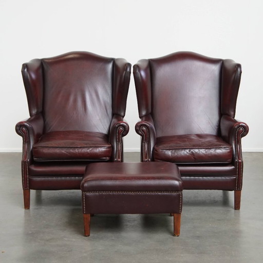 2x Bordeaux red cowhide leather ear chair + hocker in English style