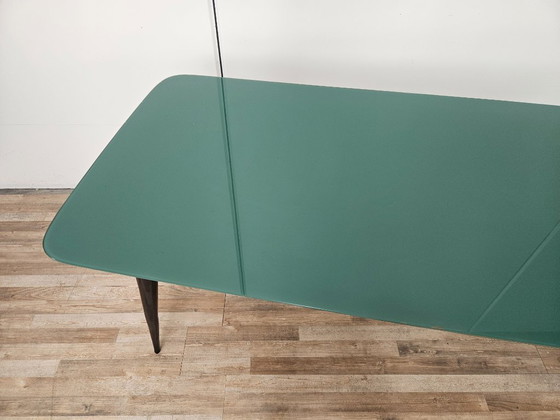 Image 1 of Mid-century mahogany dining table with aquamarine glass top