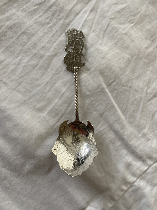 Silver djokja sugar spoon with wajang doll, Indonesia, 800